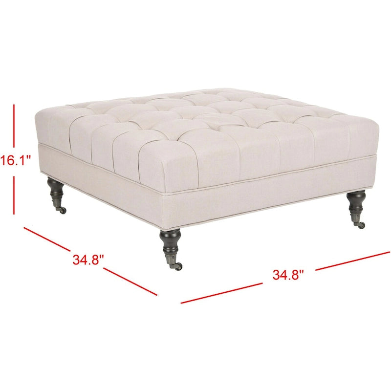 Pouf cocktail con bottoni trapuntati e gambe in legno