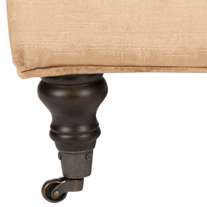 Pouf cocktail con bottoni trapuntati e gambe in legno