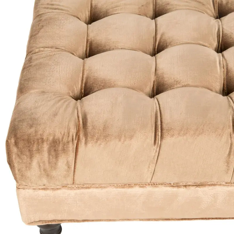 Pouf cocktail con bottoni trapuntati e gambe in legno