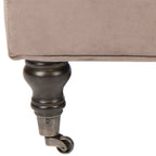 Pouf cocktail con bottoni trapuntati e gambe in legno