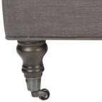 Pouf cocktail con bottoni trapuntati e gambe in legno