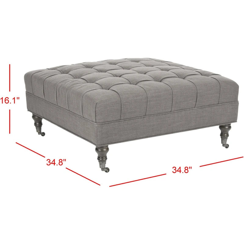 Pouf cocktail con bottoni trapuntati e gambe in legno